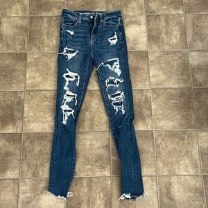 American Eagle ripped patched jeans